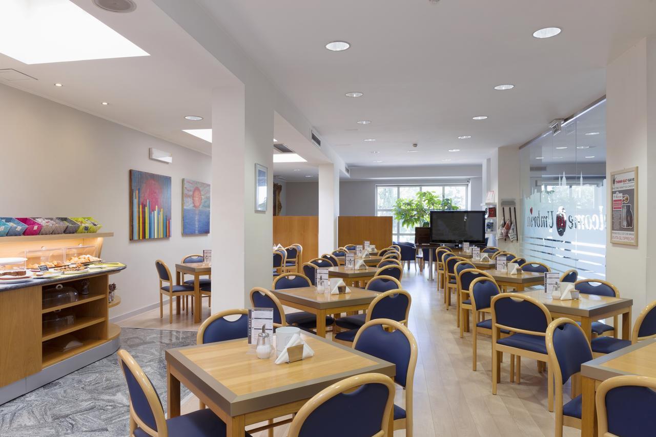 City Hotel & Suites Фолиньо Экстерьер фото