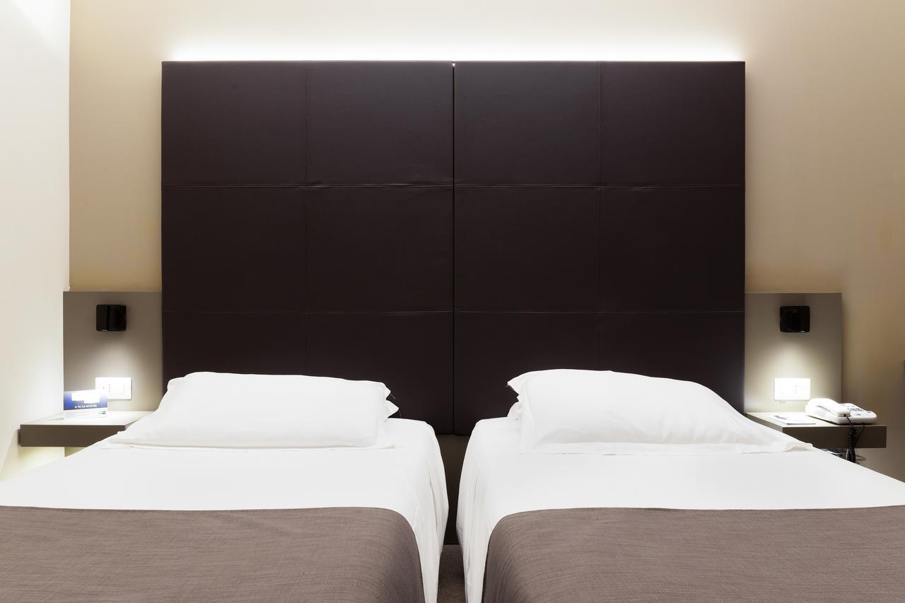 City Hotel & Suites Фолиньо Экстерьер фото